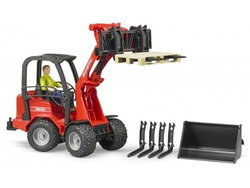 Image of Schaeffer Compact Loader 2034 with figure and accessories